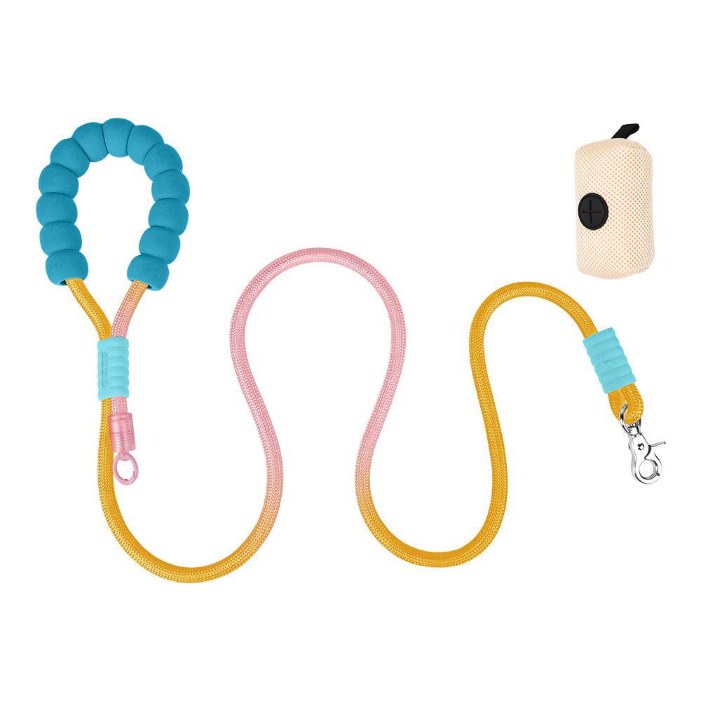 Multi-functional dog training walking leash in pink and yellow, with attached blue handle and poop bag on white background.