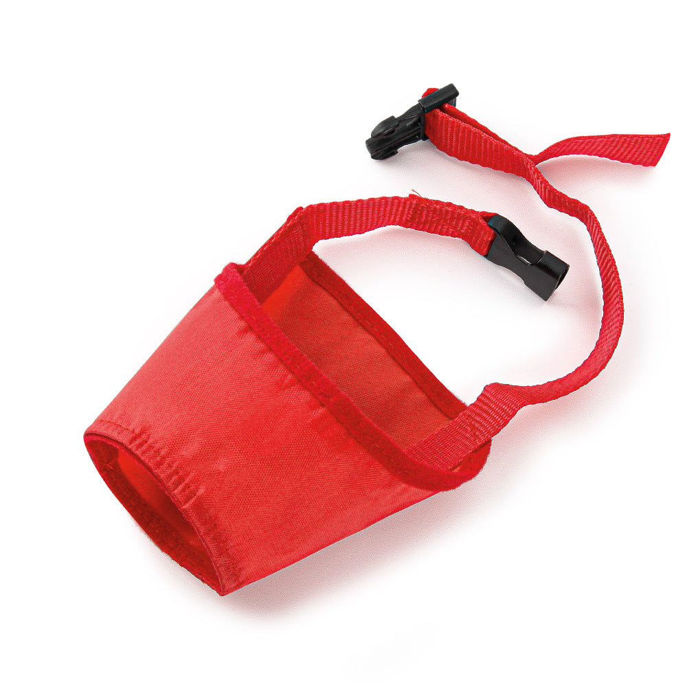Adjustable dog muzzle in vibrant red with a secure black strap, designed for comfortable wear and protection against accidental ingestion.