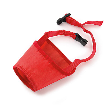 Adjustable dog muzzle in vibrant red with a secure black strap, designed for comfortable wear and protection against accidental ingestion.