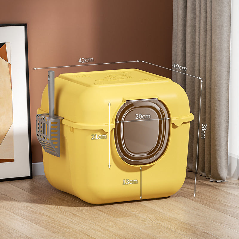 yellow full enclosed cat litter box with scoop